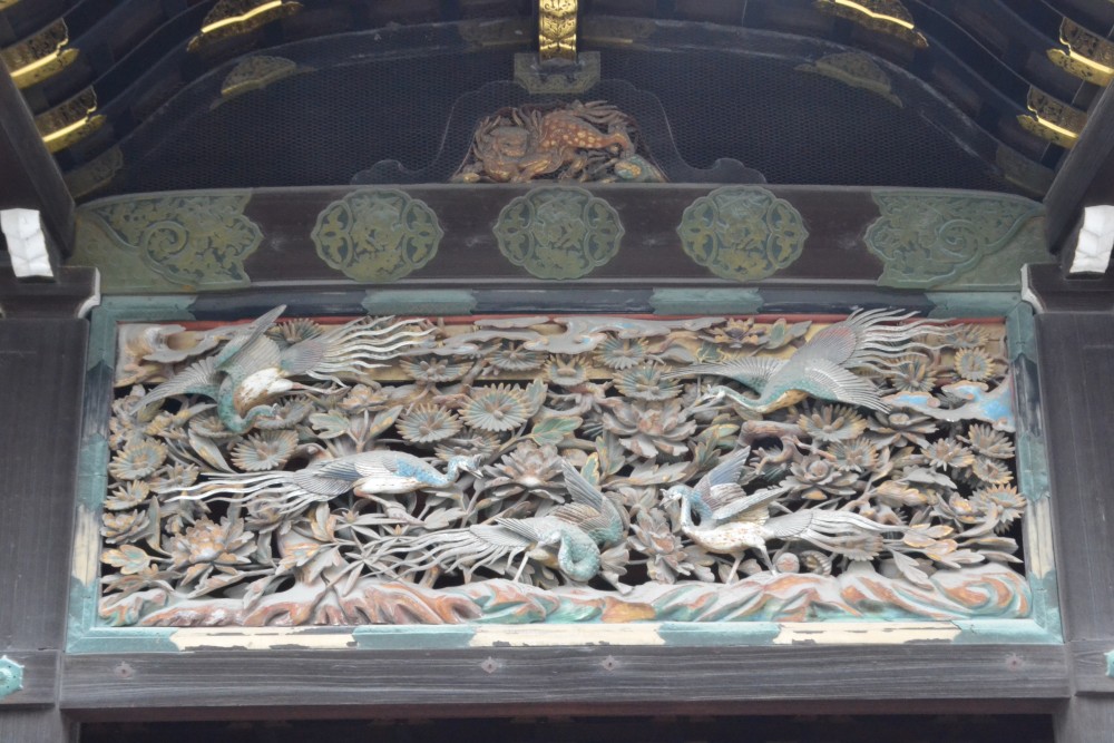Wood carving of birds that hangs above the master sake-maker's residence